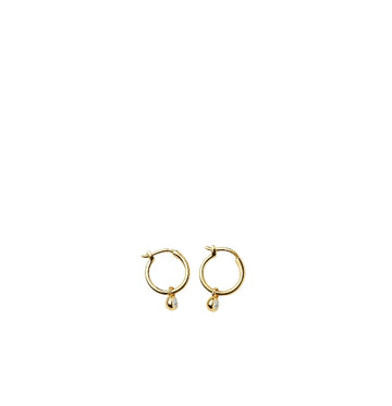 Gold hoop earrings with small round pendants on a white background