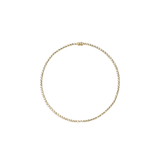 Gold chain necklace on a white background