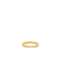 Gold ring with small stones on a white background