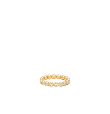 Gold ring with small stones on a white background