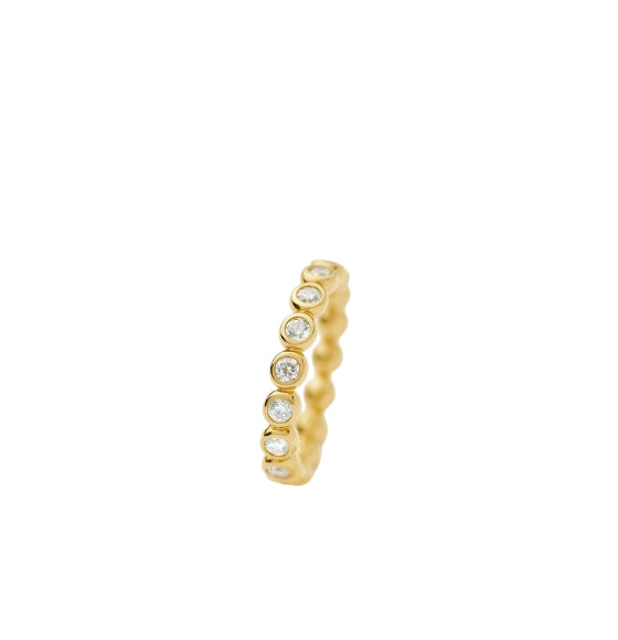 Gold ring with small stones on a white background