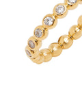 Gold bracelet with gemstones on a white background