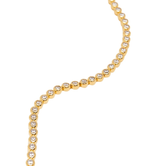Gold bracelet on a white background